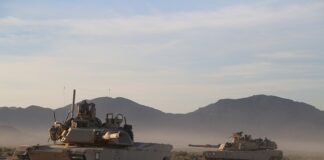 Ile pali Abrams na 100 km?